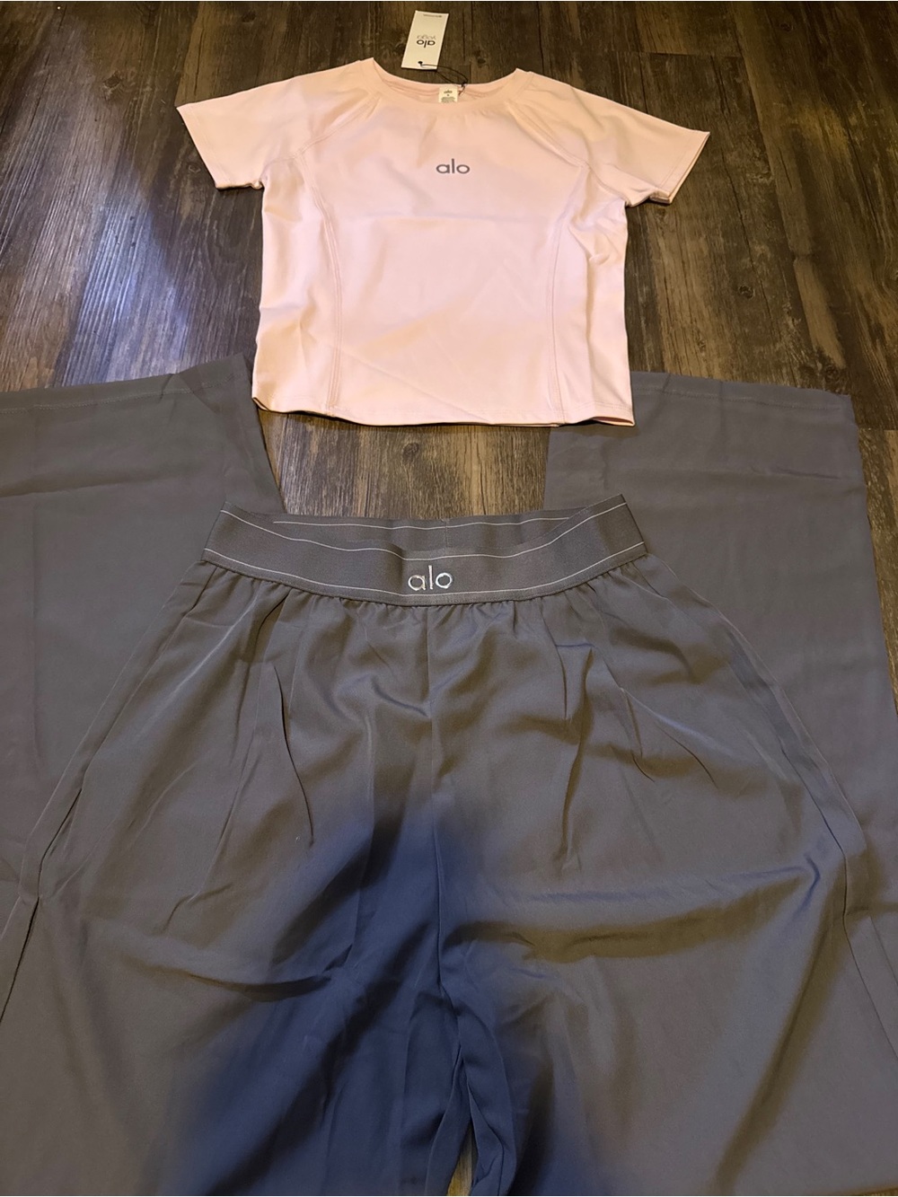 ALO Yoga Pink Short-Sleeve Top with Gray Wide-Leg Pants - Picture 2 of 3